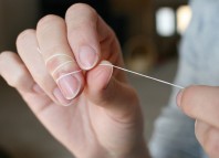 Tips para usar correctamente la seda dental